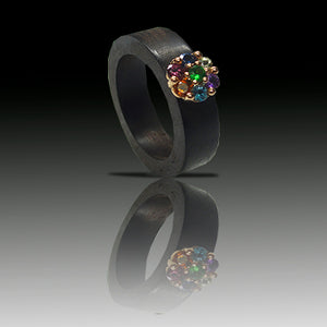 Ring of gold, ebony and semiprecious stones model Kess