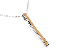 Domaur model gold and wood pendant