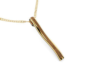 Domaur model gold and wood pendant